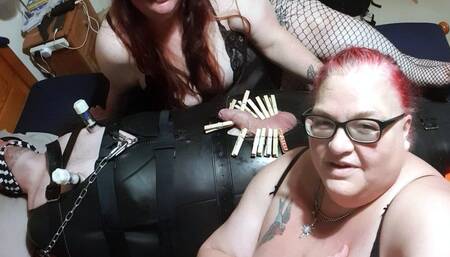 Double Domme torment on a helpless man in sleepsack - part 1 of 4