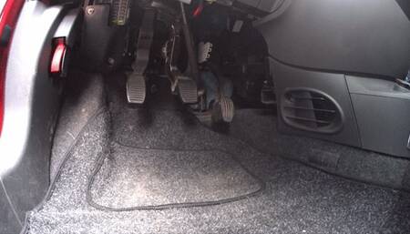 Ms Curious driving the Fiat 500 in her favorite Supergas