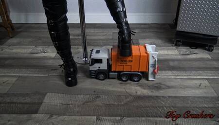 Orange and white garbage truck