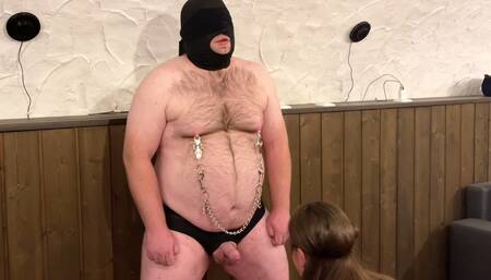 Ballbusting while he stands and endures submissively