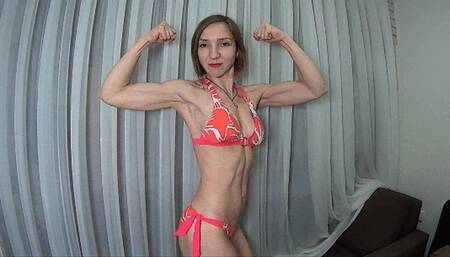 Muscles posing in bright bikini (MW)