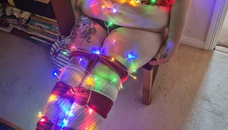 BBW wrapped in Christmas lights 3 - breast bound,  BBW bondage, socks, rope bondage, BBW domination, bound tits, woman tied up, bound breasts, bound tits, big tits, did, damsel