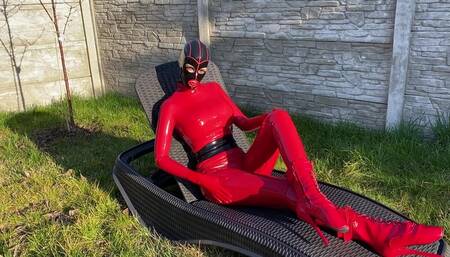 Latex doll sunbathing