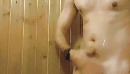 Hot stud in sauna jerking off