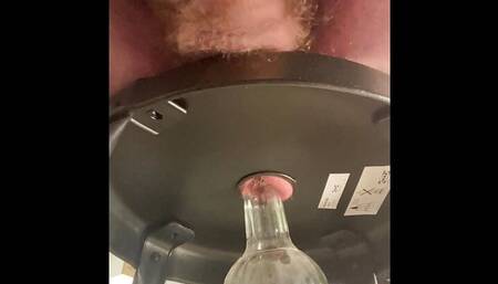 Beating my uncut cock while inserting a bottle in my hairy butthole, and a cumshot in your face.