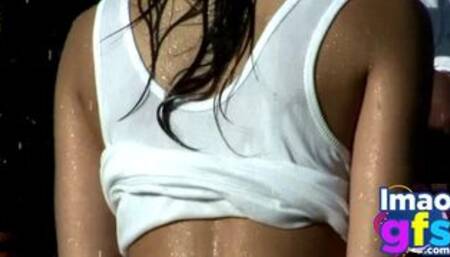 Two Hot Brunette Naked Carwash showing big medium tits and perfect ass