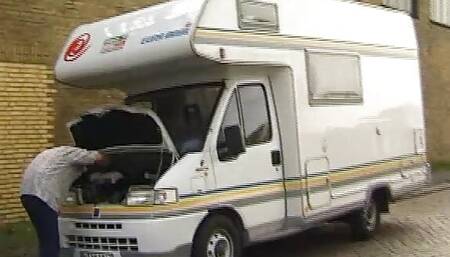 hitchhiker gets into motorhome, she has to spread her legs if she wants to ride along