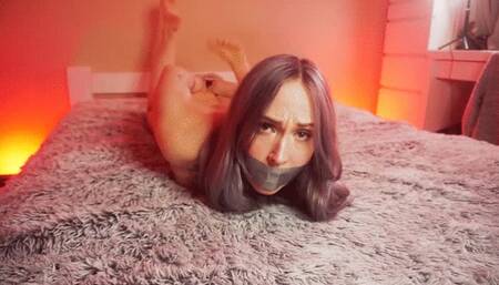 Tape Gagged Struggling and Kicking in Bondage