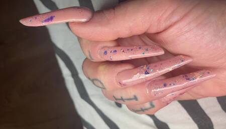 Extreme long manicure tease