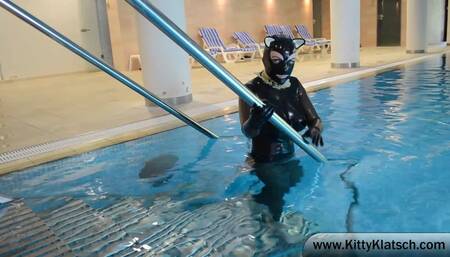 Swimming in heavy rubber in the pool