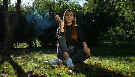 Beautiful Yulia is smoking all white cigarette