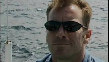 Hot blonde chick plays with her pink pussy on the boat