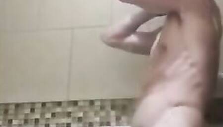Having Fun with my Huge White Penis into the gym shower