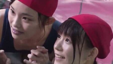 Japanese schoolgirls give swim coach underwater head