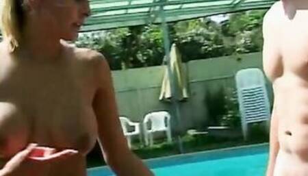 Big Boobed young nympho is ready to gives her snatch by the swimming pool