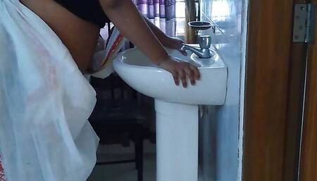 Naked Student came and fucked Indian college female teacher while fixing saree in washroom - huge ass fuck