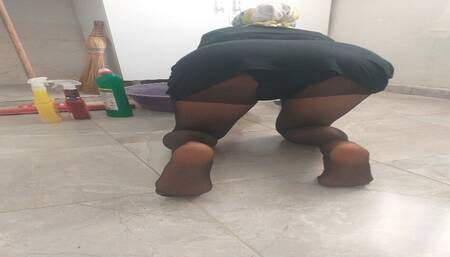 Cleaning lady in hijab and pantyhose