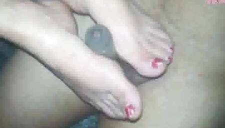 Mel footjobing a friend