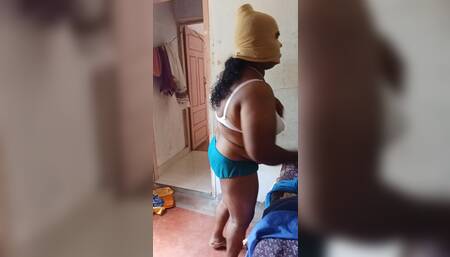Lady in bedroom dress change performance videos