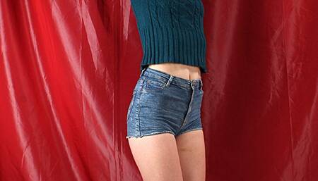 Tapegagged barefoot Mary in green sweater and jeans shorts, bound standing on the floor with her hands tied above to the rack, struggles and wiggles (HD WMV)