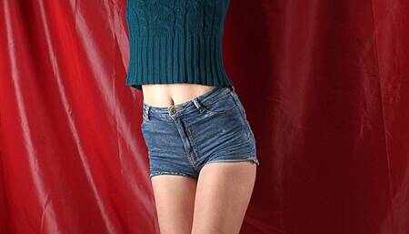 Tapegagged barefoot Mary in green sweater and jeans shorts, bound standing on the floor with her hands tied above to the rack, struggles and wiggles (HD MOV)