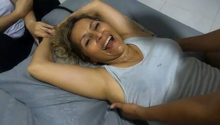 Sian tickles armpits, abdomen and ribs