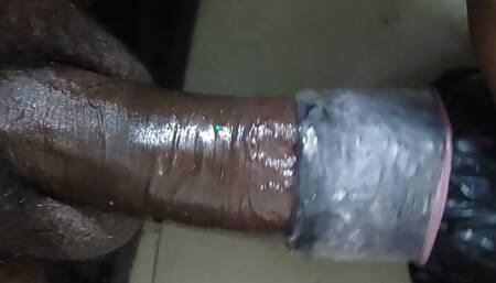 Wearing condoms sex with black artificial vagina and huge sperm come on the surface