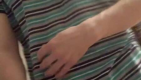 Man in the room masturbates on the bed to gay porn and cum in a bag