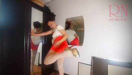 A naked lady does make-up in front of a mirror, puts on underwear, stockings, a skirt. Nudist 3