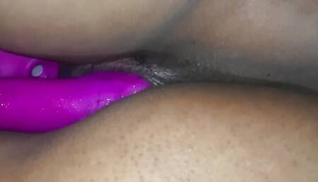 Her husband came to the back of her and rubbed her shaved pussy to thrill her sexual mood.