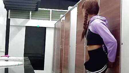 stepsister playing dildo in public toilet