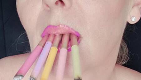 Smoker MILF smokes greedily with deep inhalations multiple 5 Sobranie color cigarettes at once