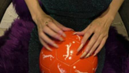 I try to destroy this soccer ball with a few nails, but in the end I puncture it with my pinky