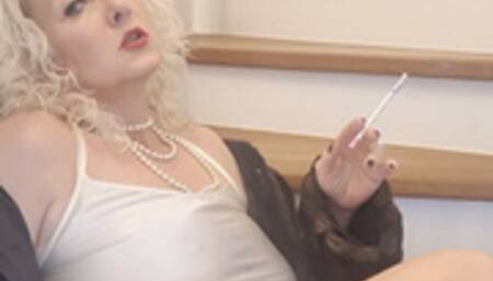 Smoker mom waits for you in the stairwell while she smokes sexy lascivious her long 120 cigarette