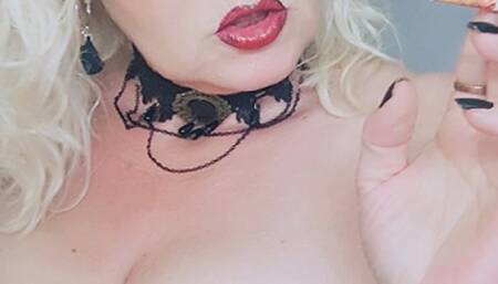 Close up thrilling seductive tits jiggle chain smoke with 2 Marlboro Red 100, once with and once filterless in a provocative red corset