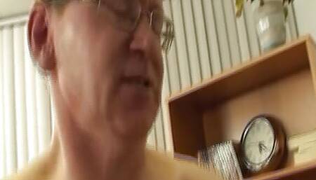 A chubby German lady with dark hair gets pounded by a long rod