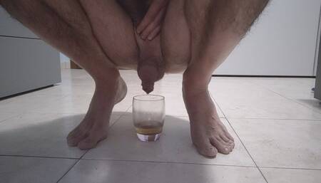 Pissing in a glass - warm, yellow and juicy pee