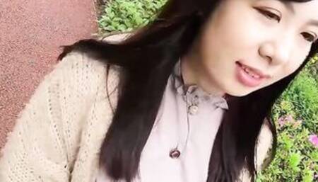 Nozomi Minami plays with our between her gigantic melons