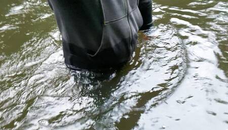 Walking into a river fully clothed and piss wet