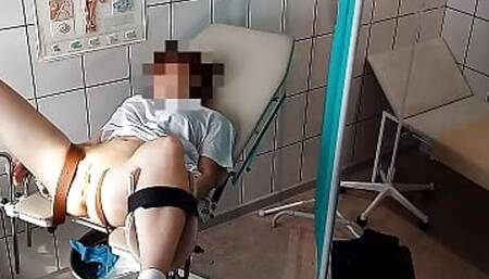 Powerful orgasm on the gynecological chair