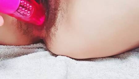 Secretary rubbing her pussy with a sex toy and climaxing