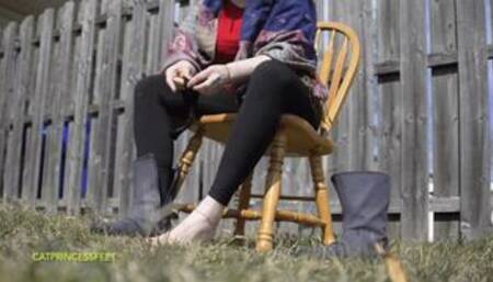 milf taking off boots, pulling on nylon socks, backyard spying, foot fetish