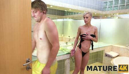 Young stud bangs mature slut Belinda Bee after seeing her naked in the bathroom