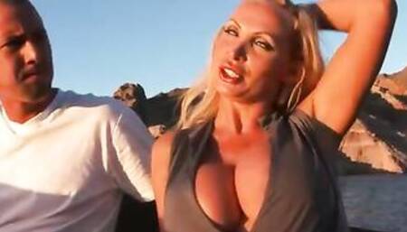 Nikki Benz fucking in the boat with her boobs