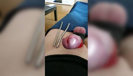 Me doing a bit of sounding And finish of with a cock plug.