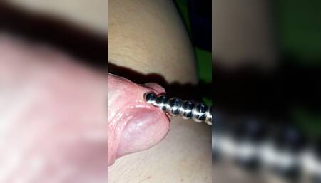 Upclose sounding with precum.
