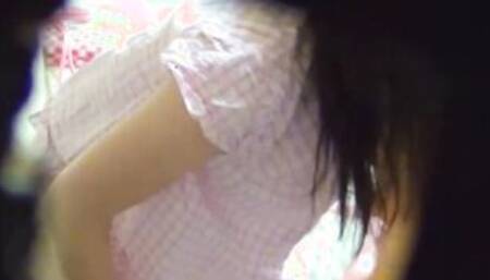 Horny Japanese girl touches her tits and masturbates alone