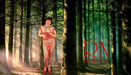 Pin-up lady posing in the forest She shows her tits and pussy Mesh tights Special effect