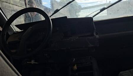 Katherine and Milah Crank the old rusty Renault 21