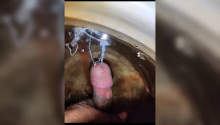 Sexy slim boy cums in water